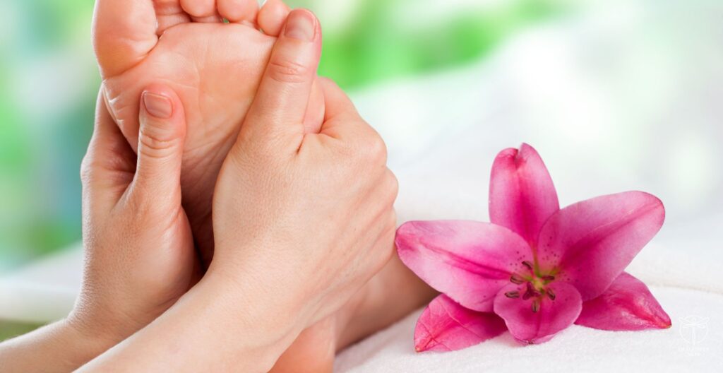 A close-up of reflexology therapy in action, with focused pressure on specific points of the foot, aiding in stress relief and healing.