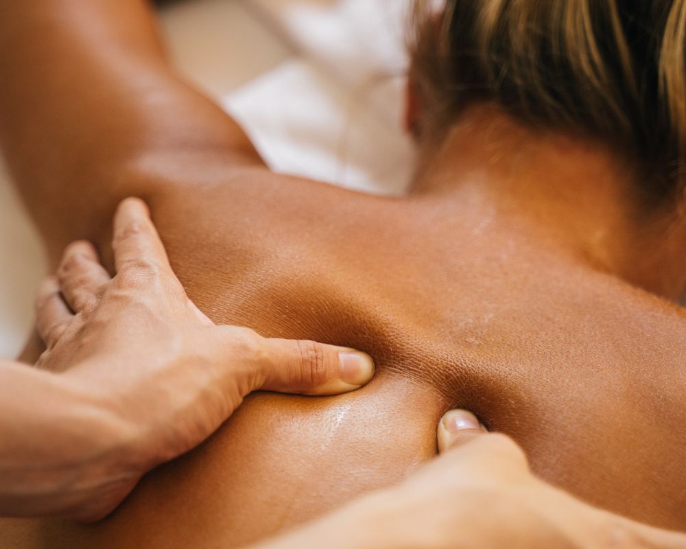 A calming deep tissue massage session offering relief from stress and muscle pain.
